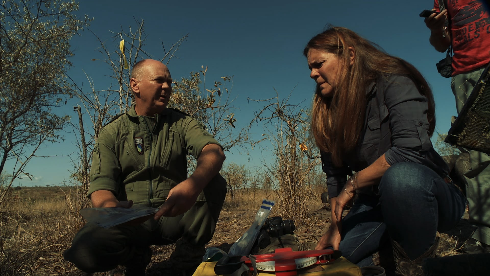 Examining the bullets recovered after rhino autopsy in Kruger